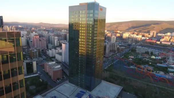 Aerial drone shot flying over Shangri-La Hotel in Ulan Bator Mongolia, during sunset. - Footage, Video