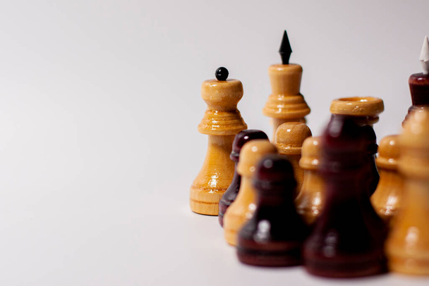 Illustration of wooden chess pieces on a white background. - Foto, imagen