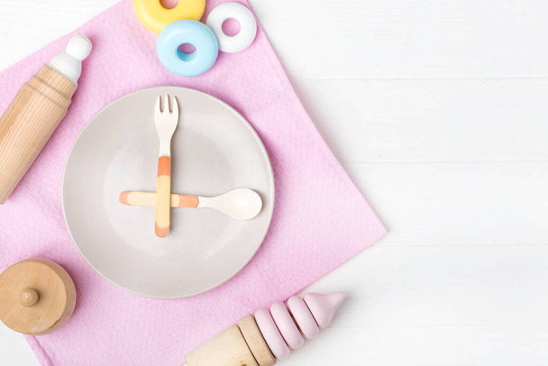 plate for baby food, concept time for baby food. Pastel color. Closeup. Baby feeding time. - Φωτογραφία, εικόνα
