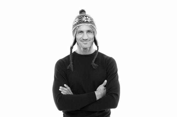 confident in his style. christmas and new year vacation. handsome man smiling in winter hat. mature man isolated on white. knitted fashion accessory for men. happy man ready for winter season - Φωτογραφία, εικόνα