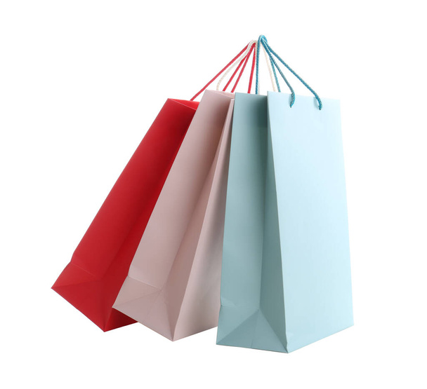 Different paper shopping bags isolated on white - Foto, Imagem