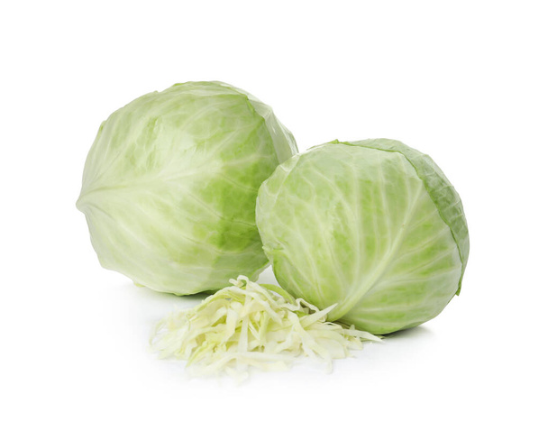 Whole and cut fresh ripe cabbages on white background - Photo, Image