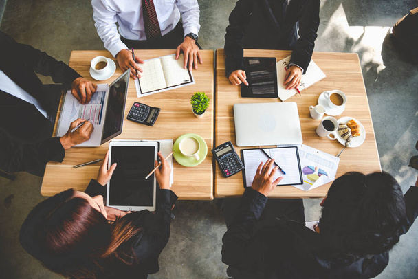 Teamwork Concept. Collaboration Team Meeting Communication with Business Teamwork Working Together in Conference Room. Top view of Diversity Partner Business Meeting Trust in Businessman and Team. - 写真・画像