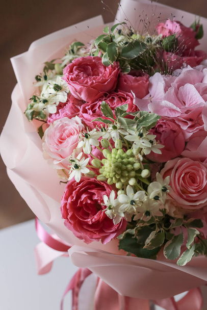 Pink flowers bouquet of roses, hydrangea, green eucalyptus leaves - Fotó, kép