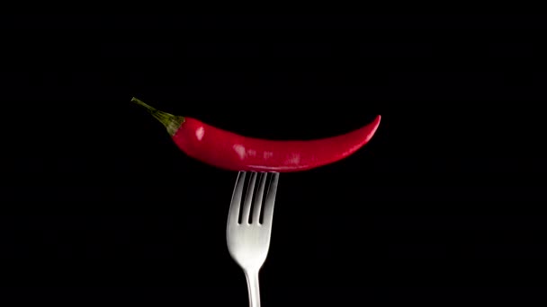 Hete rode chili peper op de vork draait - Video