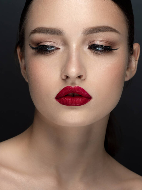 Portrait of young beautiful woman with red lips - Zdjęcie, obraz