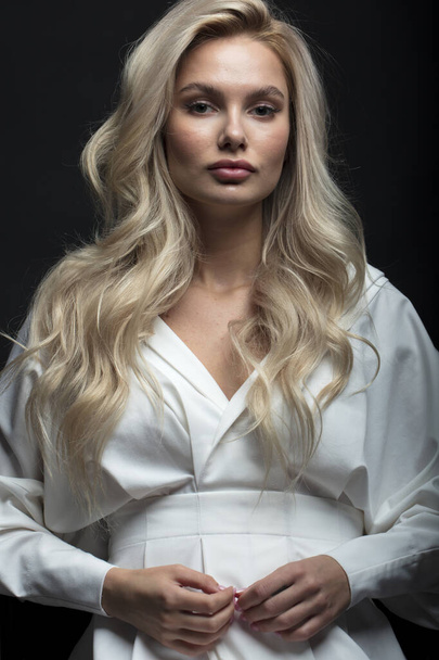 Blonde hair female model posing on camera  - Fotografie, Obrázek