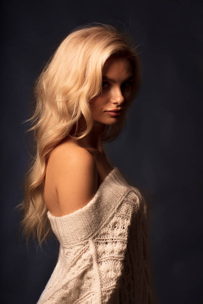 Blonde hair female model posing on camera  - Zdjęcie, obraz