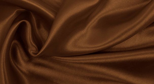 Smooth elegant brown silk or satin texture can use as abstract background. Luxurious background design. In Sepia toned. Retro style - Photo, image