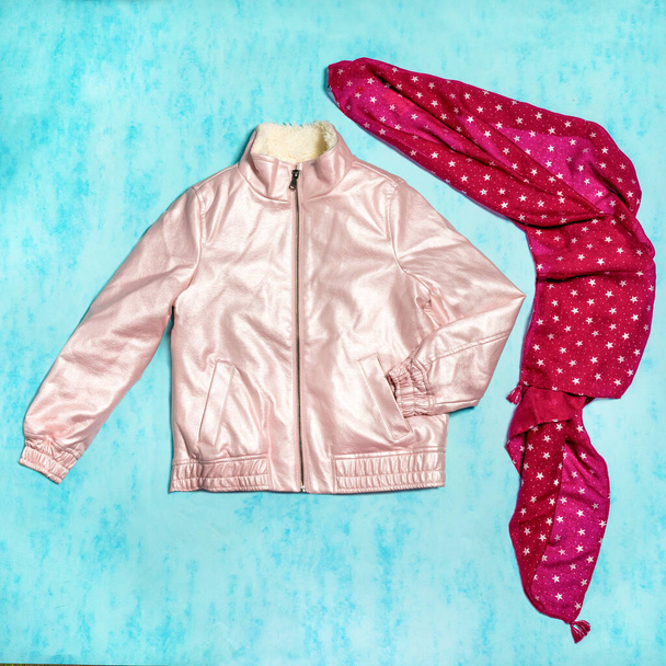 Pink woman jacket with a red scarf isolated - Photo, Image