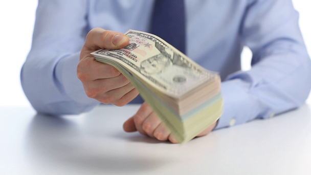 üzletember mutatja egy köteg pénzt - Felvétel, videó