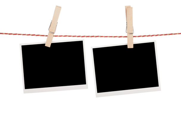 Blank photos hanging on clothesline - Photo, Image