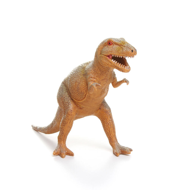 Beyaz arka planda izole edilmiş plastik dinozor oyuncağı - Fotoğraf, Görsel