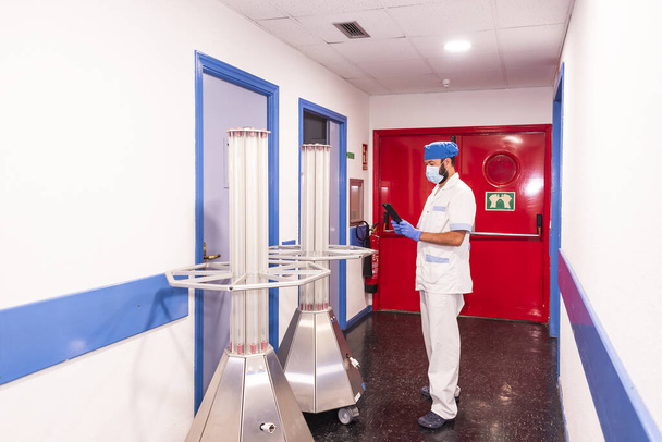 cleaning staff performing disinfection and hygiene work in hospital facilities - Zdjęcie, obraz