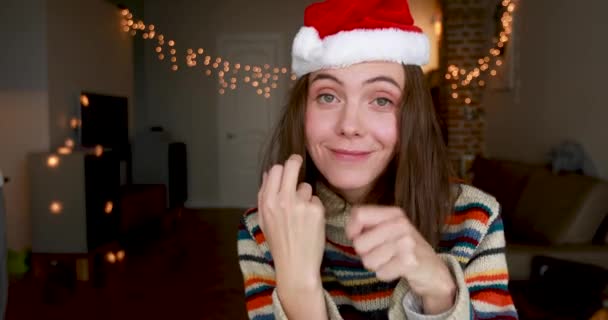 Smiling brunette with loose hair shows middle finger as joke - Materiaali, video