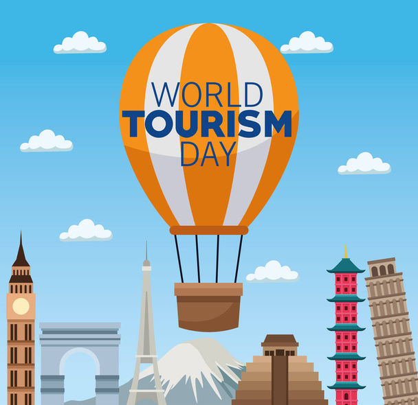 Día mundial del turismo celebración de letras con globos aire caliente y monumentos - Vector, Imagen