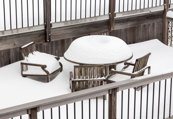 Deep snowfall on outdoor table and chairs - Photo, Image