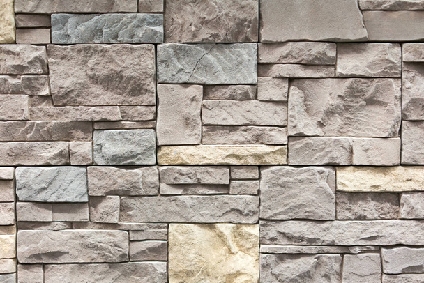 Seamless texture of white decorative stacked stone, natural stone cladding. brick background. close up. Background. - Photo, Image
