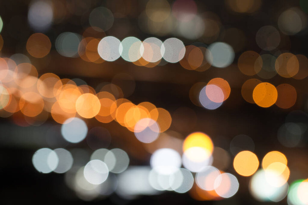 Defocused city night light blurred with bokeh abstract background - Foto, Bild