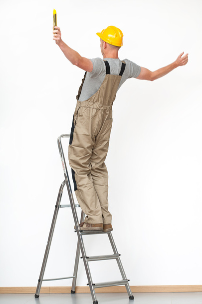 Worker falling from ladder - Photo, image