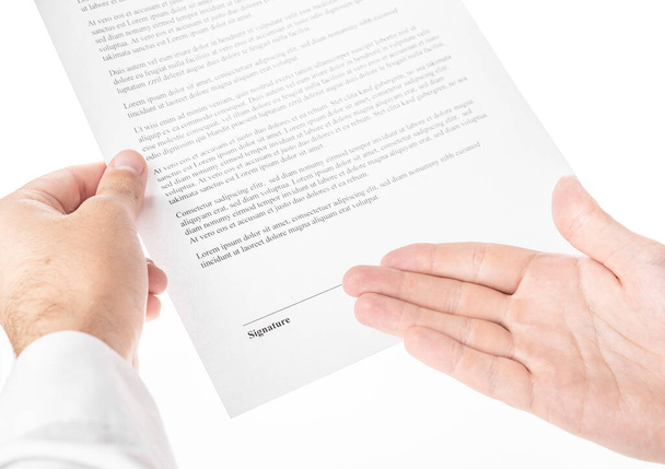 businessman holds a contract for signature on a white background. business concept. - Zdjęcie, obraz