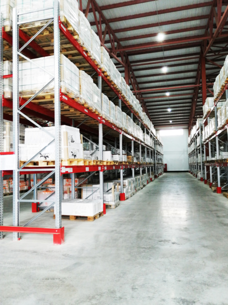 Shelving System With Boxes in Distribution Warehouse, Large industrial warehouse with high racks. - Photo, Image