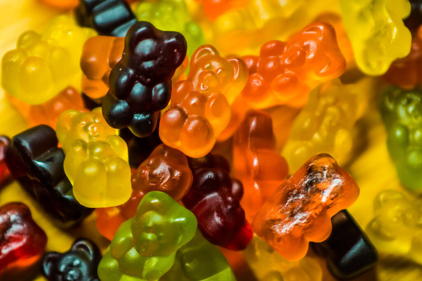 Many sweet and tasty gummy bears close-up. - Foto, Imagen