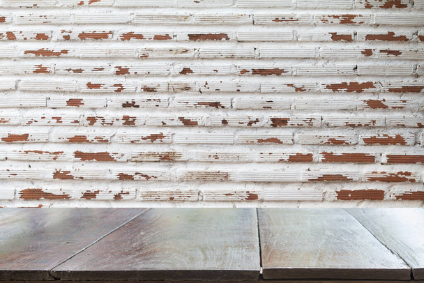 Empty desk with White brick wall for vintage abstract background. - Photo, Image