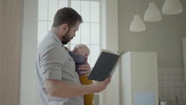 Dad Reading To Toddler Son - Footage, Video