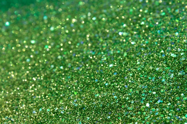 Green glitter and sequins holographic background - Photo, Image