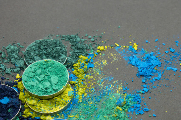 Shades of Blue and Green crushed Eyesshadow on a Black background - Фото, изображение