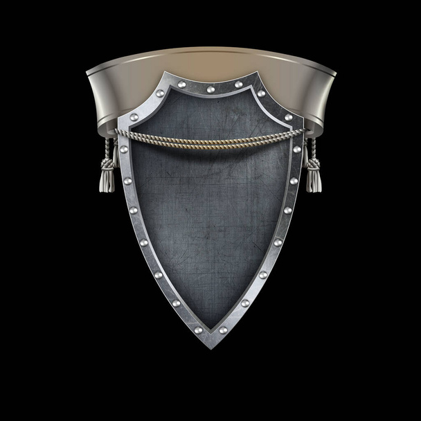 Silver riveted shield with scroll on black background. - Zdjęcie, obraz