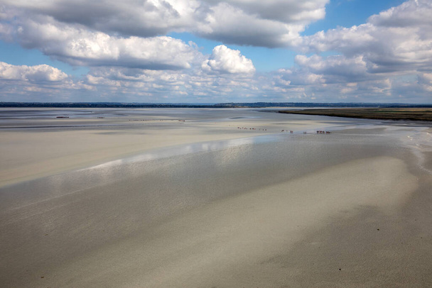 Low tide in the bay in front of Mont Saint Michel in Normandy, France. - Photo, Image