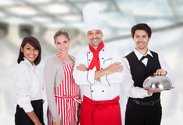 Chef and waiters - Фото, изображение