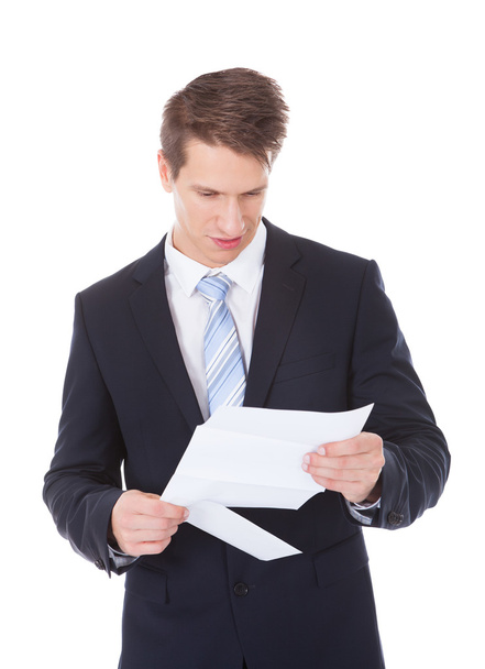 Businessman Reading Document - Foto, Bild