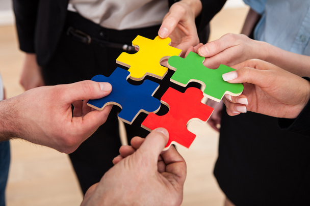 Businesspeople with Jigsaw Puzzle - Photo, Image