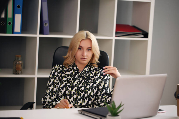 Adult young pretty business woman working at her office. She is very busy and hot. - Fotó, kép