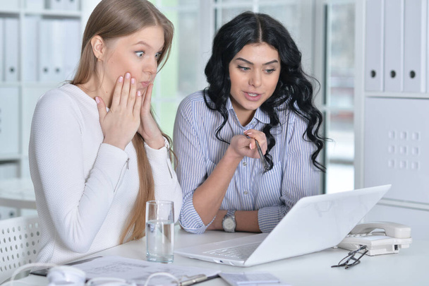young  confused businesswomen working in modern office - Photo, Image