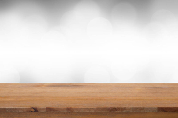 Empty of desk with blurred light gray gradient bokeh abstract background. - Photo, Image