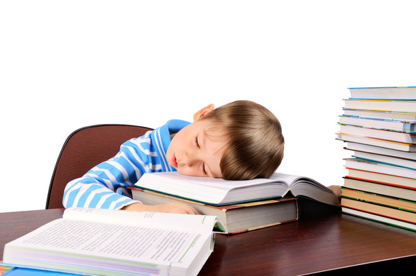 Маленький хлопчик заснув на книгах
 - Фото, зображення