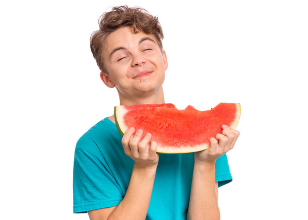 Teen boy with watermelon on white - Фото, зображення
