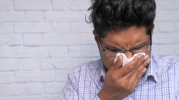 Portrait of sick man sneezes and coughs - Footage, Video