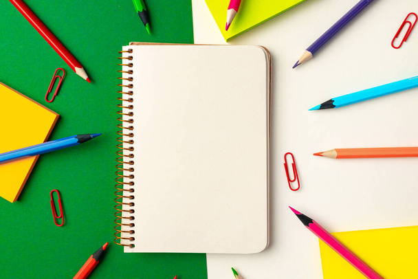 Top view of school supplies, pencils and notepad - Foto, immagini