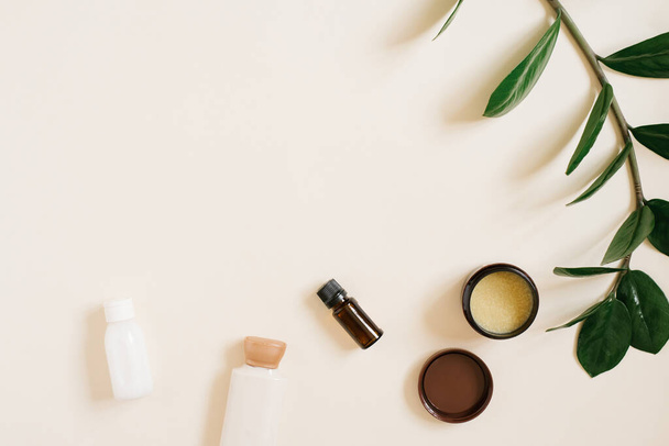 Set of natural organic SPA cosmetics on a light beige background. The view from the top herbal cosmetics for skin care. . Flat lay minimalist style. Layout for an eco-store or beauty salon - Fotoğraf, Görsel