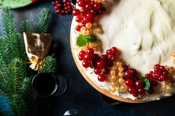 Christmas fruit cake. Pudding. New Year cake. Cherry cake. Christmas decoration. Xmas dessert. Family celebration. Holiday. Piece of cake. Christmas tree - 写真・画像
