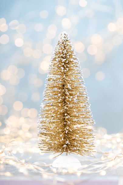 Christmas tree on bokeh background. Christmas holiday celebration concept. Greeting card.  - Фото, изображение