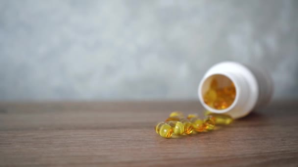 fish oil in capsules is on the table. - Footage, Video