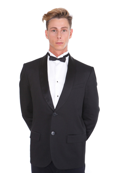 Young man in black tuxedo  - Foto, afbeelding