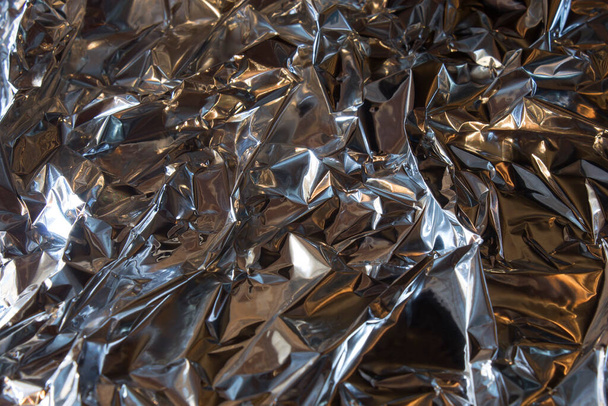 This is a closeup photograph of Aluminum foil - Фото, изображение