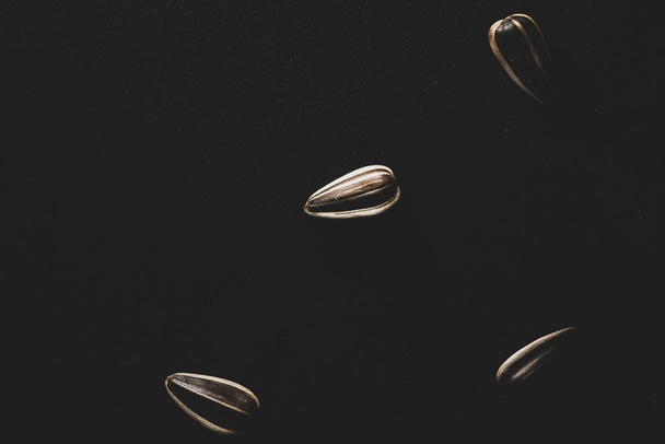 Βιολογικοί σπόροι ηλίανθου Μακρο close up, επιλεκτική εστίαση - Φωτογραφία, εικόνα